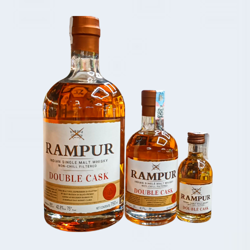 <h4>Rampur Double Cask</h4>
                                             <div class='border-bottom my-3'></div> 
                                            <table id='alt-table' cellpadding='3' cellspacing='1' border='1' align='center' width='80%'>
                                                <thead id='head-dark'><tr><th>Quantity</th><th>Price/Unit</th></tr></thead>
                                                 <tr>
                                                    <td>750ml</td>
                                                    <td class='price'>₹8510</td>
                                                </tr>
                                                 <tr>
                                                    <td>180ml</td>
                                                    <td class='price'>₹2060</td>
                                                </tr>
                                                 <tr>
                                                    <td>60ml</td>
                                                    <td class='price'>₹700</td>
                                                </tr>
                                
                                            </table>
                                            <b class='text-start'>Description :</b>
                                            <p class='text-justify mt-2'>
                                       Rampur Double Cask is an Indian single malt whisky aged in American bourbon and European sherry casks, resulting in a complex profile with a full-bodied aroma of tropical fruits, malt, and oak. Its flavor palate features sweet fruits, dried fruits, and rich sherry, with notes of vanilla, caramel, spices, and oak, leading to a long, warm finish. 
                                            </p>